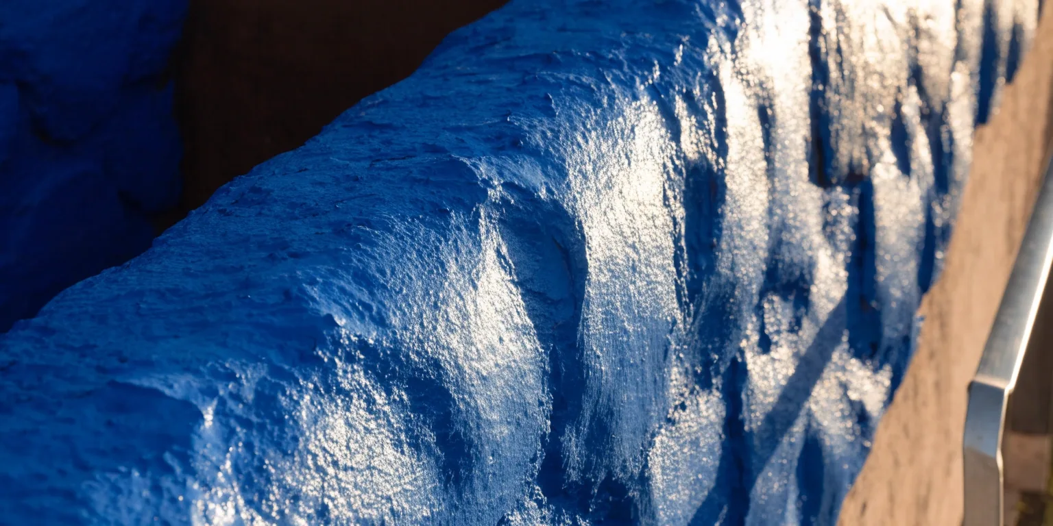 Close detail of the cobalt blue painted wall at the Majorelle Garden